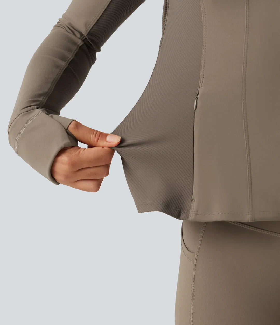 Halara UltraSculpt Hooded Long Sleeve Ruffle Hem Yoga Track Jacket with Pockets and  Thumb Holes