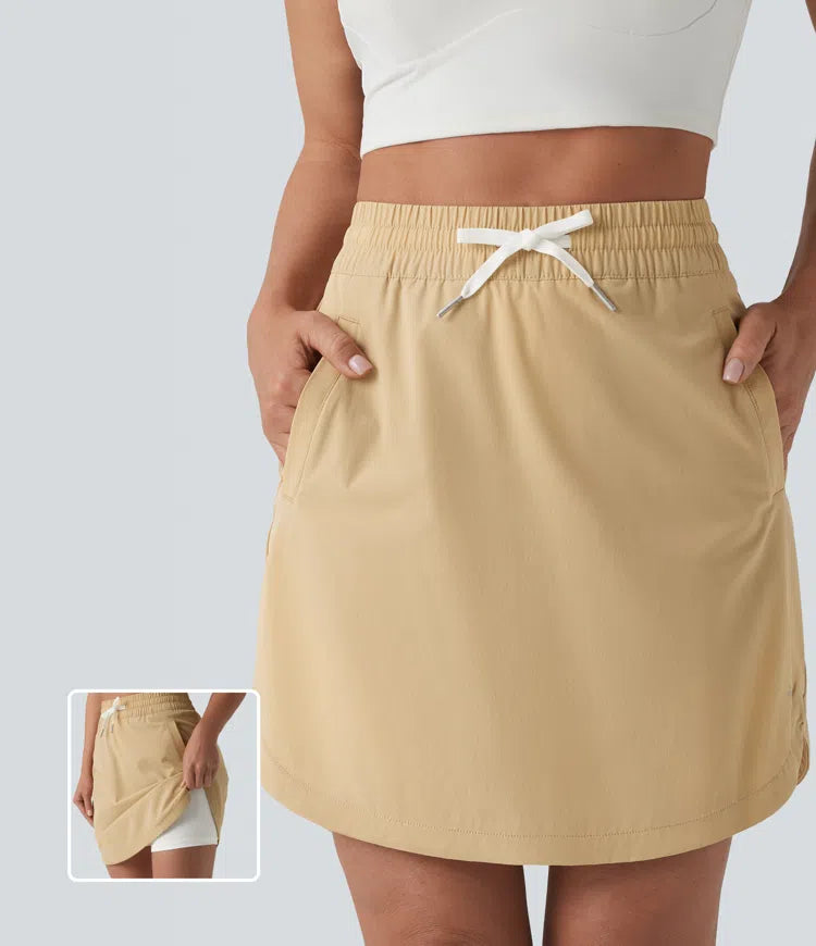 High Waisted Drawstring 2-in-1 Curved Hem Mini Golf Skirt with Pockets-Longer Length