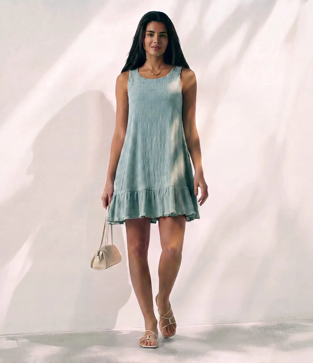 Round Neck Built-in Bra Sleeveless Ruffle Hem Mini Casual Dress